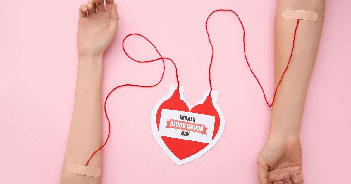 due persone unite dalla flebo di sangue