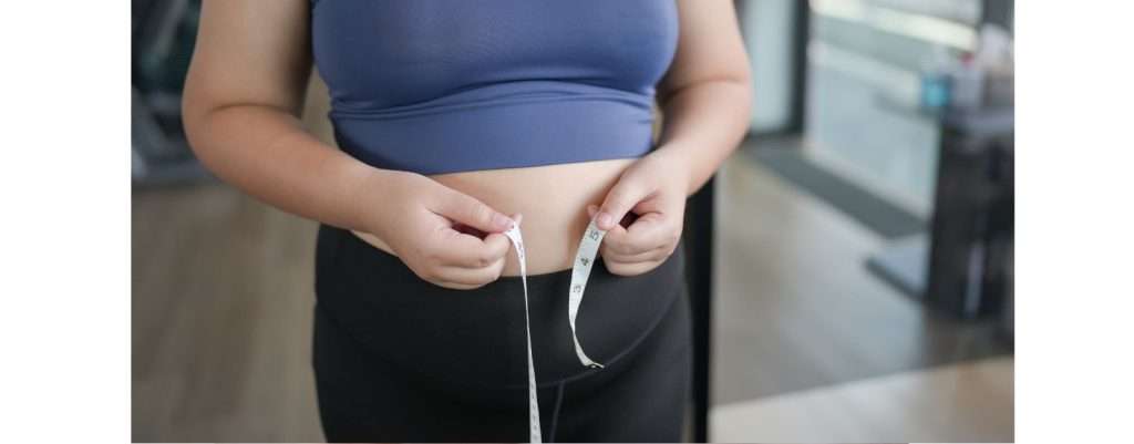 signora obesa, obesità può essere uno dei fattori scatenanti del tumore al pancreas